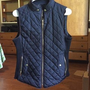 Black vest with gold details